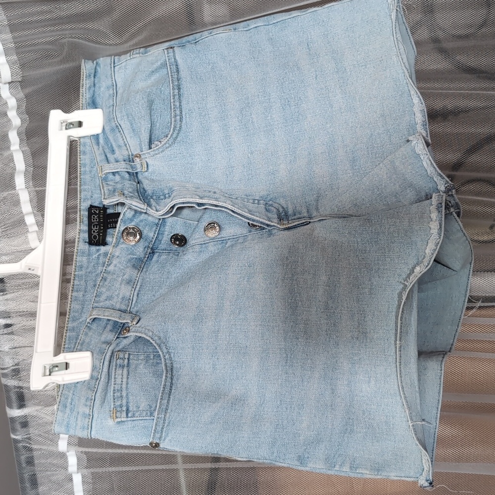 Forever 21 brand. Size 12 denim shorts. Light wash.